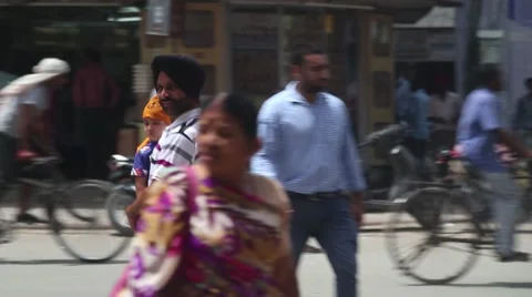 Man and boy walking through crowded street Video stock 41415421