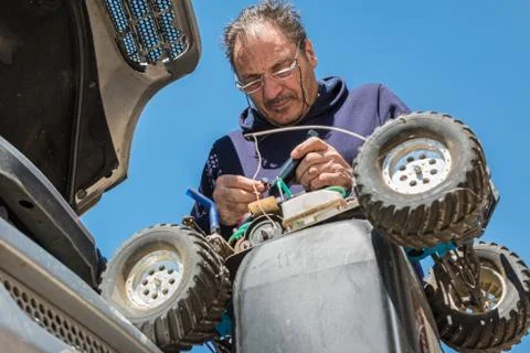 Man and car modelling Stock Photos