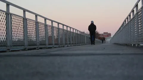 Man and child walking in evening in industrial territory Stock Footage 17048338