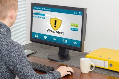 Man and computer antivirus Stock Photos