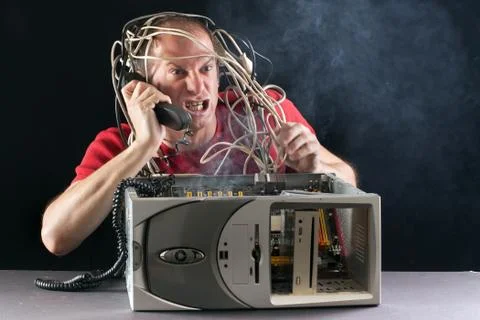 Man and computer burning 스톡 사진