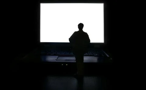 Man and computer Stock Photos