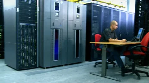 Man and computer server Stock Footage
