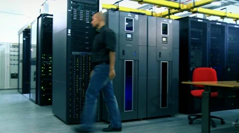 Man and computer server Stock Footage