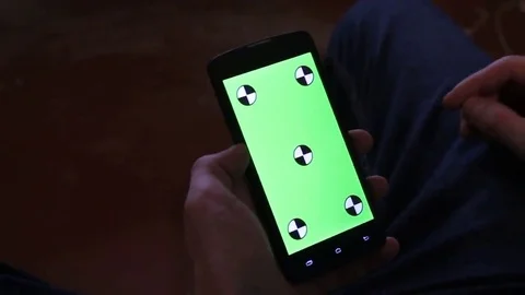 Man and a green screen smartphone Stock Footage 69214010