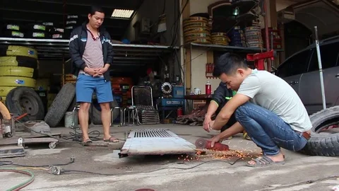 Man and grinder Stock Footage 72984091