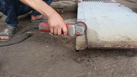 Man and grinder Stock Footage 73058605