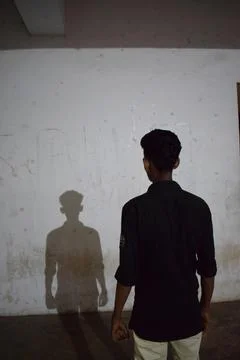 A man and his shadow Stock Photos