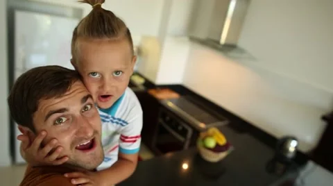 A man and his son makes selfie Stock Footage 57799367