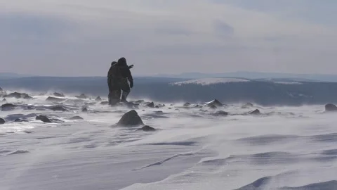 Man and kid walk in Uralic mountains Stock Footage 282741902