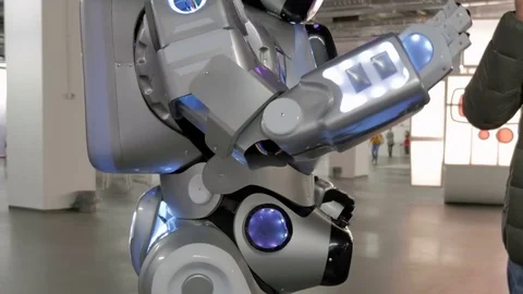 Man and Robot give a five, a greeting. Stock Footage 83570429