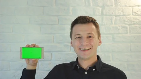 Man and smartphone to camera Stock Footage 91659992