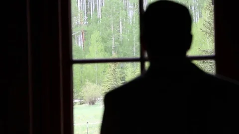 Man and window Stock Footage 70940441