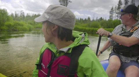 Man and woman converse and raft Stock Footage 59737051