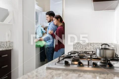 Man And Woman Doing Chores Washing Clothes Stock Photos