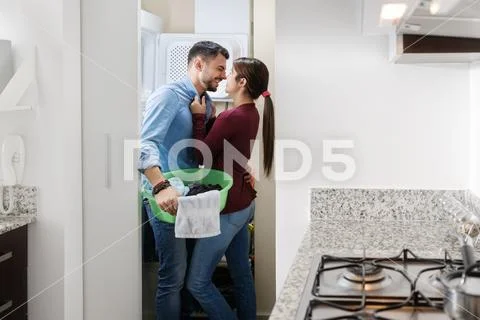 Man And Woman Doing Chores Washing Clothes Stock Photos