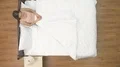 The man and woman drink a coffee in the bed. view from above 4k or 4k+ Resolution