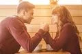 The man and woman drink a coffee in the restaurant Photo