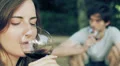 a man and a woman drink wine in sync HD Footage