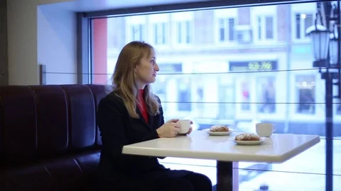 Man and woman drinking tea in the cafe Stock Footage 70278531