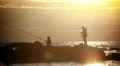 A man and a woman fishing HD Footage