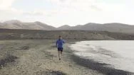 Man And Woman Jogging On The Beach, Super Slow Motion, Shot At 240Fps Hd Stock Footage