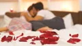 The man and a woman kissing on the bed with a gift box 4k or 4k+ Resolution