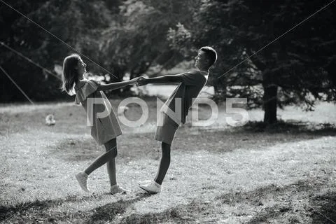 Man and woman in the park Stock Photos