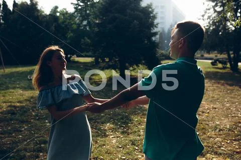 Man and woman in the park Stock Photos