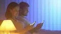 The man and woman phone in the bed. night time 4k or 4k+ Resolution