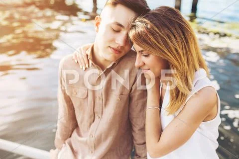 Man and woman posing on the lake Stock Photos