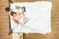 The man and woman read on the bed. View from above Photo