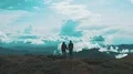 The man and woman standing on the mountain with a picturesque landscape 4k or 4k+ Resolution