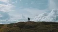The man and woman standing on a mountain 4k or 4k+ Resolution