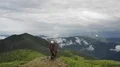 The man and woman standing on a picturesque mountain 4k or 4k+ Resolution