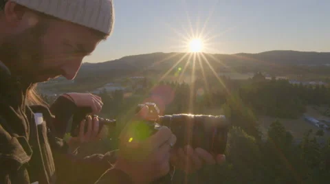 Man and woman take pictures on hot air balloon Stock Footage 59795417
