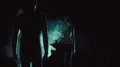 The man and woman walking in a dark through a smoke cloud. slow motion 4k or 4k+ Resolution