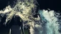 The man and woman walking in a dark through the smoke cloud. slow motion 4k or 4k+ Resolution
