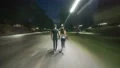 The man and woman walking in an evening park. Hyperlapse 4k or 4k+ Resolution