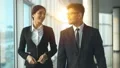 The man and a woman walking near panoramic windows. slow motion HD Footage