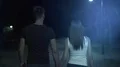 The man and woman walking in the night park 4k or 4k+ Resolution