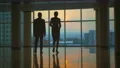 The man and a woman walking in the office hall. slow motion 4k or 4k+ Resolution