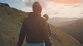 The man and woman walking on the picturesque mountain 4k or 4k+ Resolution