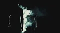 The man and woman walking through a smoke cloud in a dark background 4k or 4k+ Resolution