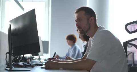 Man and women soft ware developers working at big city IT office 4k Footage Video stock 242570345