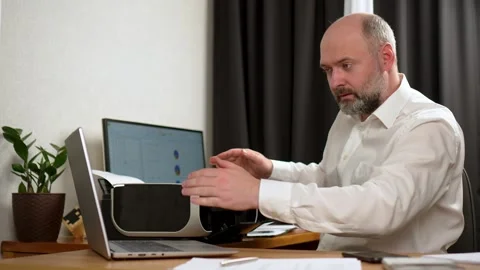 Man angrily pounds on broken printer, rips off cover and throws it away 動画素材 265423120