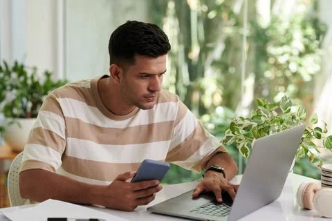 Man Answering E-mails on Laptop Stock Photos