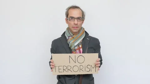 Man Appearing against Terrorism with Tablet Stock Footage 64544204