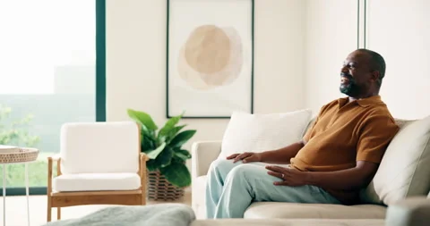Man, applause and watching tv on couch with sports game, goal celebration and Stock Footage 337756821