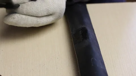 A man applies a rubber patch smeared with glue to the puncture site in a bicy 스톡 동영상 138760496